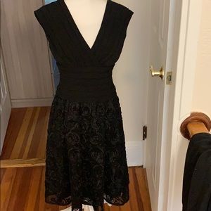 Adrianna Papell romantic black cocktail dress.